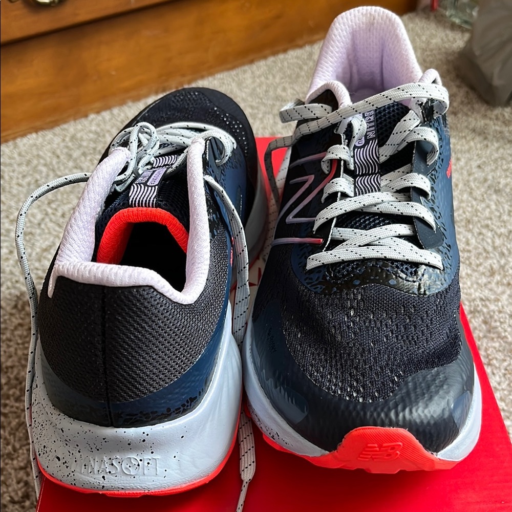 New Balance Black and Red Sneakers